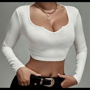 A white comfy top! Cute for the winter I recommend wearing it with a blouse!